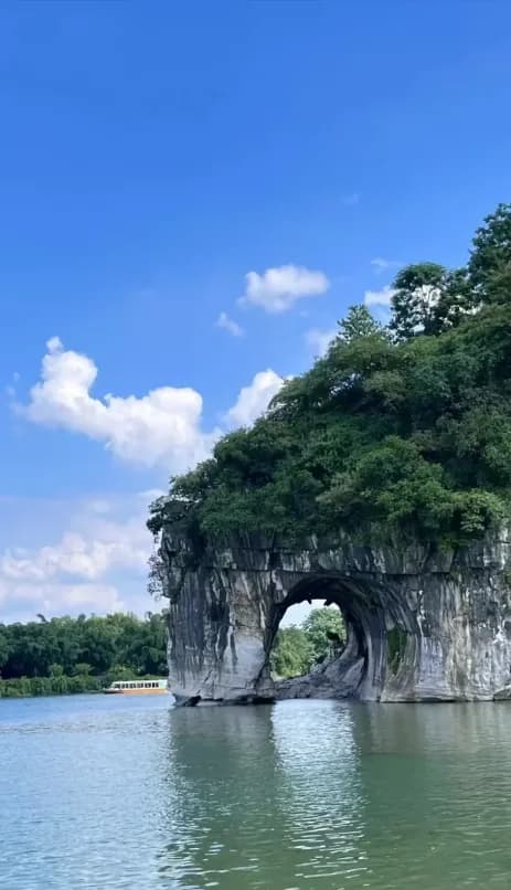 Elephant Trunk Hill and the Water Moon Cave arch on the river at Guilin
