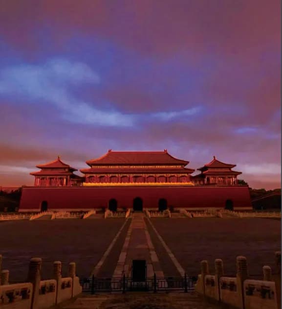 The Forbidden City at dusk seen across its outer courtyard