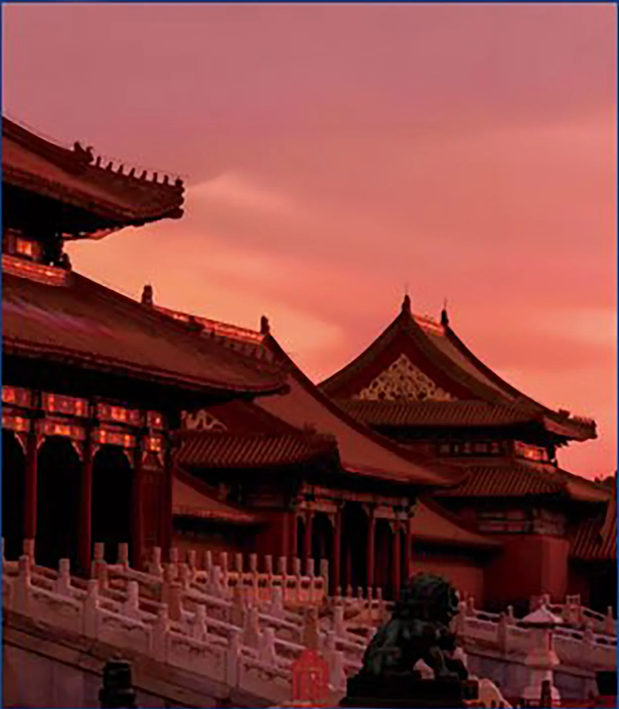 Forbidden City rooftops glowing under a red sky