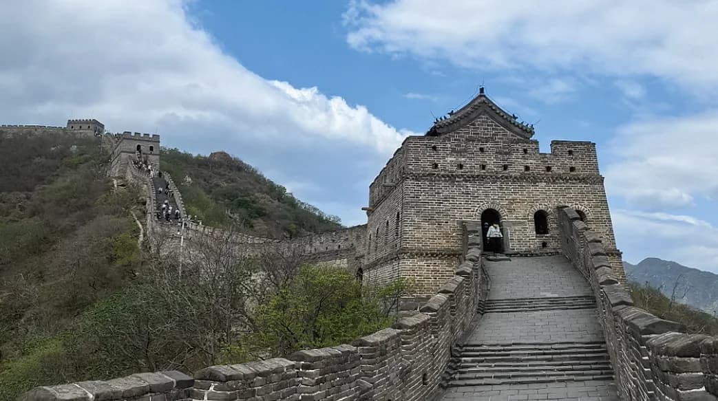 Stone stairway climbing to a Mutianyu watchtower