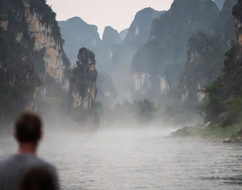 Karst peaks rising out of low cloud